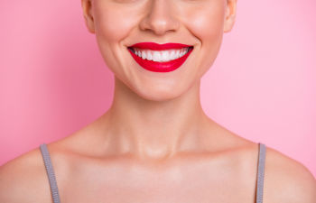 Cheerful girl after teeth whitening.