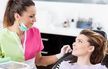 woman in a dental chair during a dental appointment