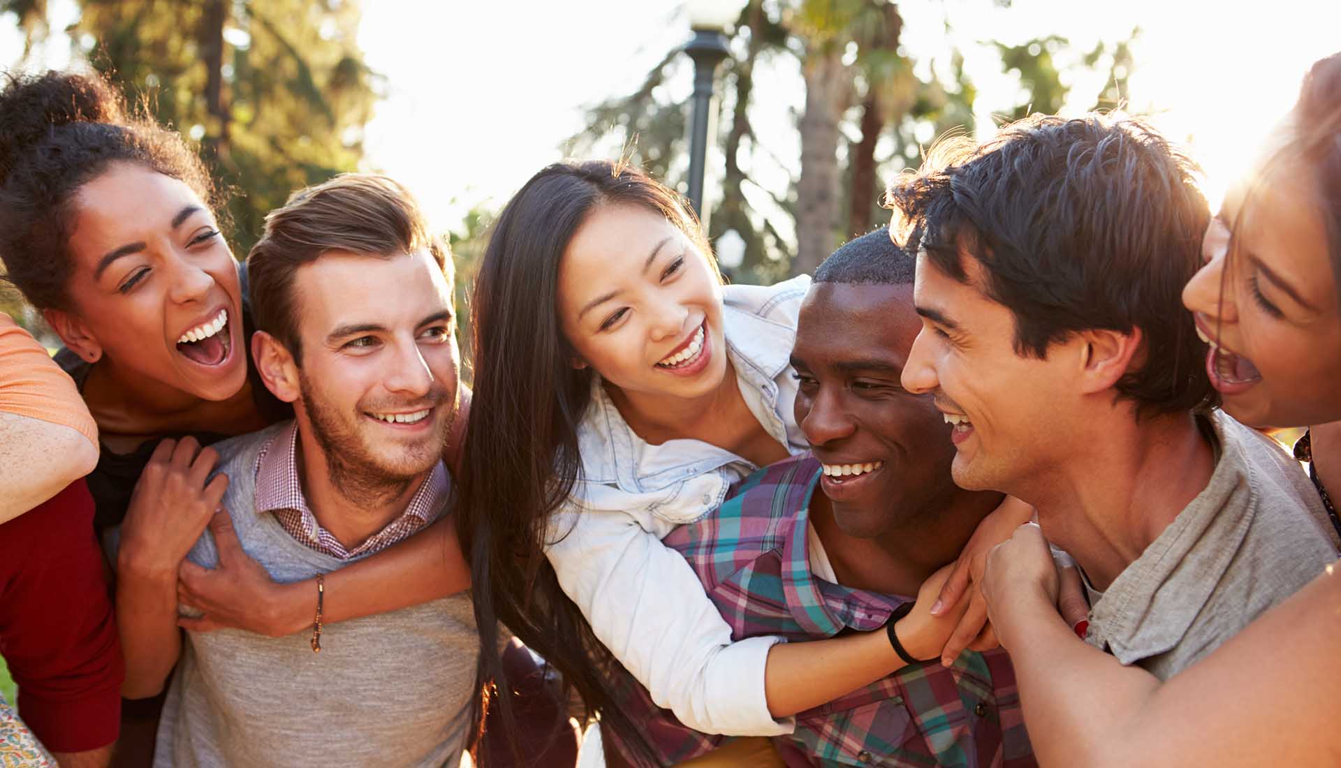 Group Of Friends Having Fun Together Outdoors