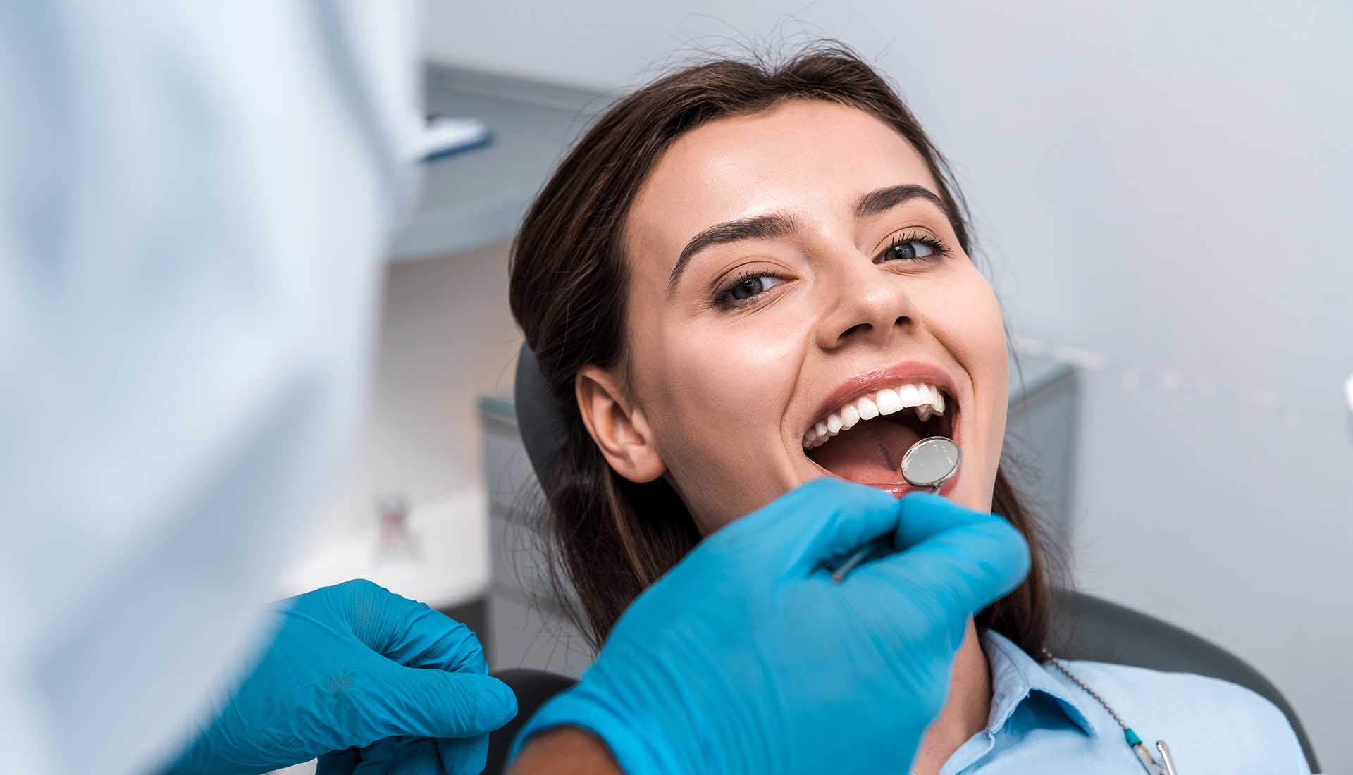 woman in a dental chair during a dental checkup